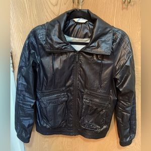 Adidas women’s windbreaker with foldable hood, and cotton lining - size small